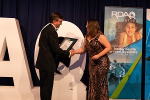 Woman accepting award